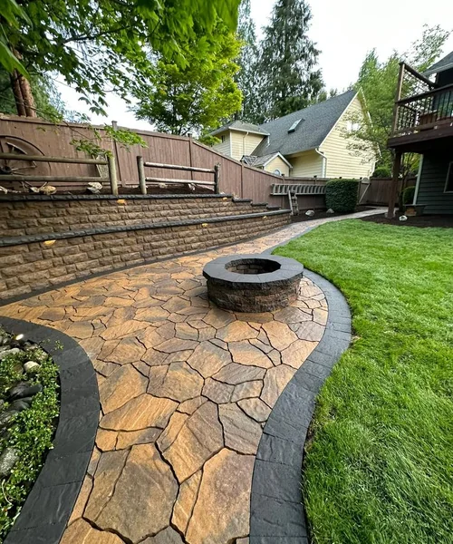 Installation of natural Grass, Retaining wall construction & Fire Pit in Lake Stevens 